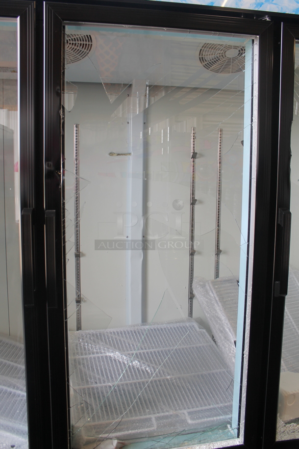 BRAND NEW SCRATCH AND DENT! 2023 Avantco 178GDC69HCB 78 1/4" Black Metal Commercial 3 Door Cooler Merchandiser with LED Lighting and Poly Coated Racks. 115 Volts, 1 Phase. Tested and Powers On But Does Not Get Cold - Image 4 of 8