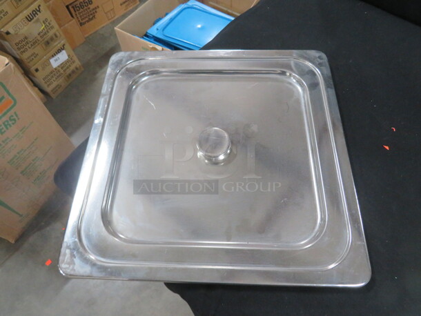 One 14X14 Stainless Steel Lid. 