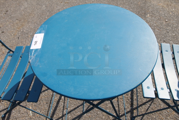 Blue Metal Round Folding Table and 2 Blue Metal Folding Chairs. 23.5x23.5x27.5, 16.5x14.5x32 - Image 2 of 5
