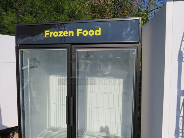 One True 2 Door Glass  Display Freezer With 8 Racks. Model# GDM-49F-LD. 54X30X79. $8004.16. - Image 2 of 3