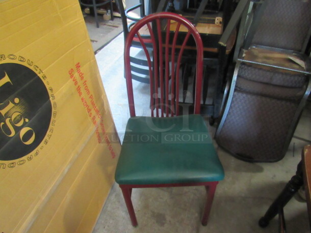 Metal Chair With Green Cushion Seat. 7XBID.
