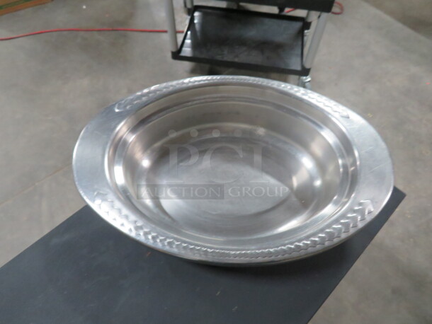 One Bon Chef Stainless Steel Oval Pan With Embossed Rim. 13X9X3. #82WF.  - Image 1 of 1
