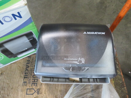 One NEW Georgia Pacific Marathon Automatic Hands Free Paper Towel Dispenser.