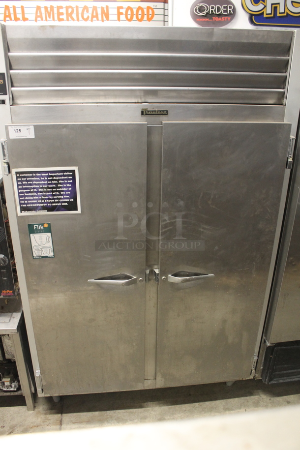 Traulsen G20010 Commercial Stainless Steel Two-Door Reach-In Cooler With Polycoated Shelves And Pan Racks. 115V, 1 Phase. Tested and Powers On But Does Not Get Cold