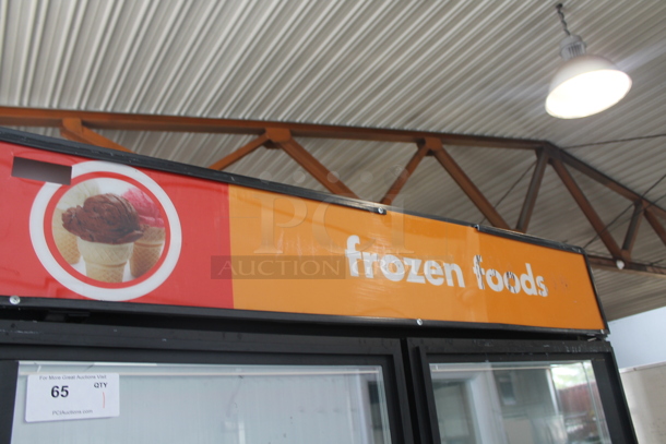 2011 True GDM-49F ENERGY STAR Metal Commercial 2 Door Reach In Freezer Merchandiser w/ Poly Coated Racks on Commercial Casters. 115/208-230 Volts, 1 Phase.  - Image 2 of 8