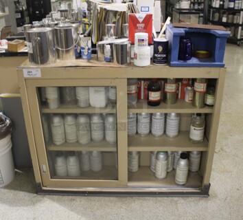 Tan Metal 2 Door Cabinet w/ Contents Including Methacrylic Acid. BUYER MUST REMOVE. 