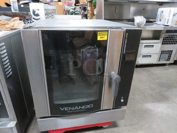 One Venancio Professional Natural Gas Convection Oven. 240 Volt. 29X36X32