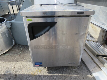 One Turbo Air 1 Door Worktop Freezer, With 1 Rack, On Casters. Model# TWF-28SD-N. 115 Volt. 27.5X24X35