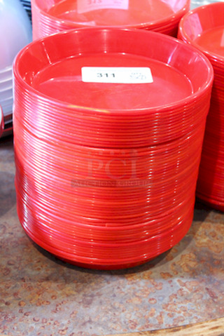 HUGE STACK! 11" Red Round Plastic Serving Platters. 
11x1-1/2
50x Your Bid