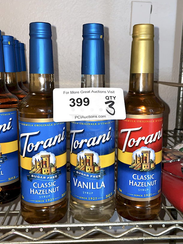 Torani Trio: (1) Sugar Free classic Hazelnut, (1) Sugar Free Vanilla Syrup, (1) Classic Hazelnut Syrup 25oz Bottles 3x Your Bid - Image 1 of 1