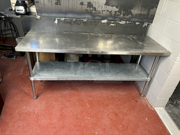 LIKE NEW! Stainless Steel Work Table With Under-Shelf...Please don't mind the dust. 72x24x34 - Image 1 of 5