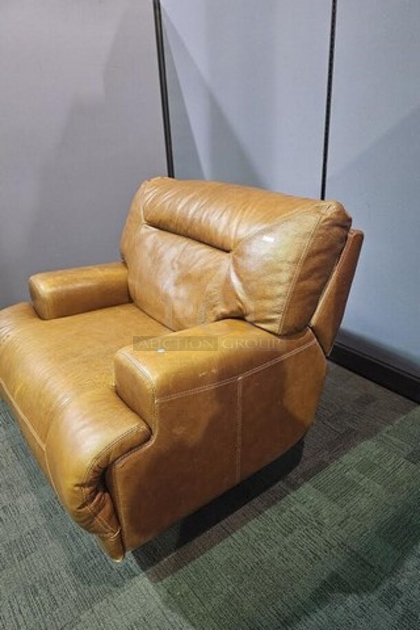 Oversized light brown chair. Chateau D’ax brand and in good condition with some signs of use and wear, but still a very nice chair. Nothing broken. Measures 39” H x 46” W x 40” D.  

 - Image 2 of 4