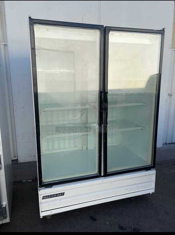 Certified Working Master-Bilt BLG-52HD Low Temp Glass Door Freezer Merchandiser 220 Volt 1 Phase  - Image 1 of 11