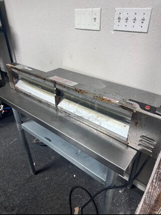 APW Wyott FD-36H 36 inch High Wattage Strip Food Warmer with Toggle Controls - 120V, 920W Working