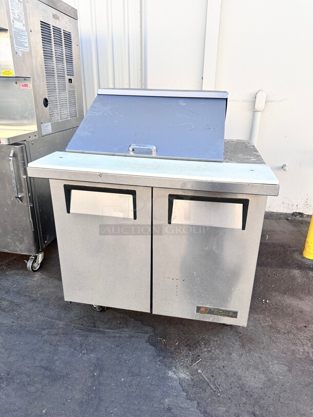 True TSSU-36-12M-B 36 3/8" 2 Door Mega Top Refrigerated Sandwich Prep Table 115 Volt Working - Image 1 of 5
