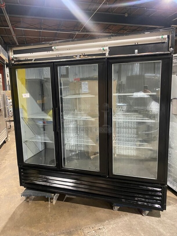 True Commercial 3 Door Reach In Freezer Merchandiser! With View Through Doors! With Poly Coated Racks! Model: GDM72F SN: 14613956 115/208/230V 60HZ 1 Phase