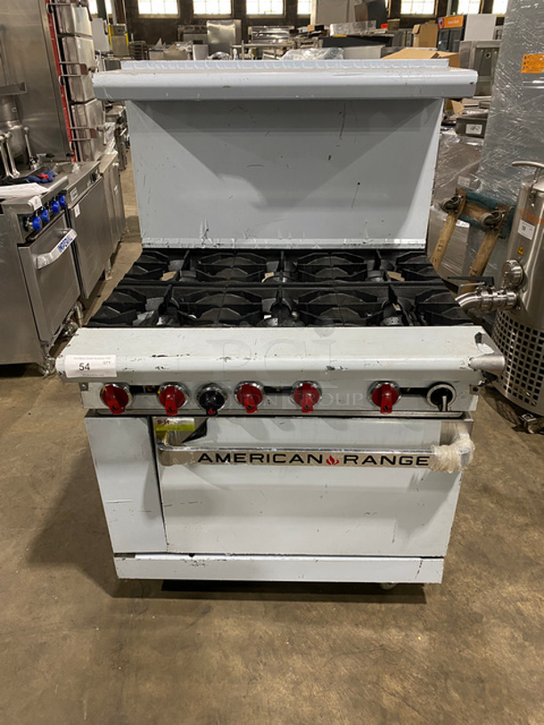 NEVER USED! LATE MODEL! 2018 American Range Natural Gas Powered 6 Burner Stove! With Full Size Oven Underneath! With Raised Back Splash And Salamander Shelf! All Stainless Steel! On Casters! Model: AR6 SN: 180914018