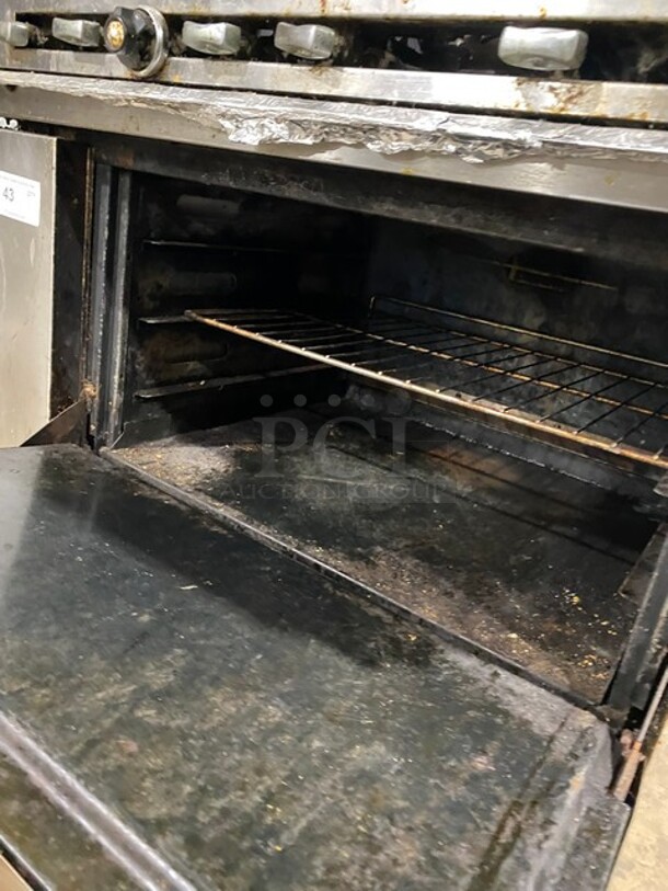 WOW! DCS Commercial Natural Gas Powered 6 Burner Stove! With Full Size Oven Underneath! With Backsplash & Overhead Salamander Shelf! All Stainless Steel! On Casters! WORKING WHEN REMOVED! - Image 7 of 9
