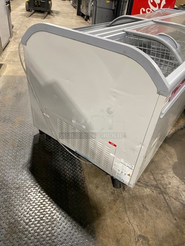 2016 AHT Chest Freezer Merchandiser! Model Manhattan210VS Serial 34990700000059! 110-120V 1Phase! With Baskets! One Glass Door Missing! On Legs!
 - Image 3 of 9