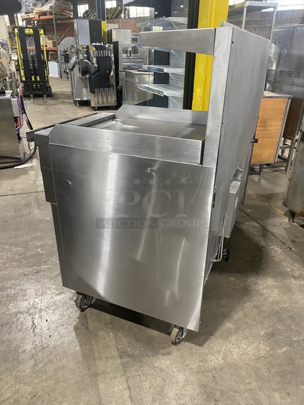 BEAUTIFUL! GARLAND All Stainless Steel Natural Gas Powered 6 Burner Range W/ Raised Right Side Flat Top W/ Cheese Melter! With 2 Ovens W/ Metal Racks! With Raised Over Back Splash & Slamander Shelf! On Commercial Casters! Working When Removed! - Image 3 of 9