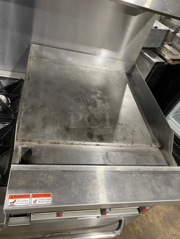 FAB! CPG Commercial Natural Gas Powered 6 Burner Stove With Right Side Flat Griddle And Cheese Melter Combo! Griddle Has Side Splashes! With Raised Back Splash And Salamander Shelf! With 2 Oven Underneath! Metal Oven Racks! All Stainless Steel! On Casters! SN: 01210402 - Image 7 of 12