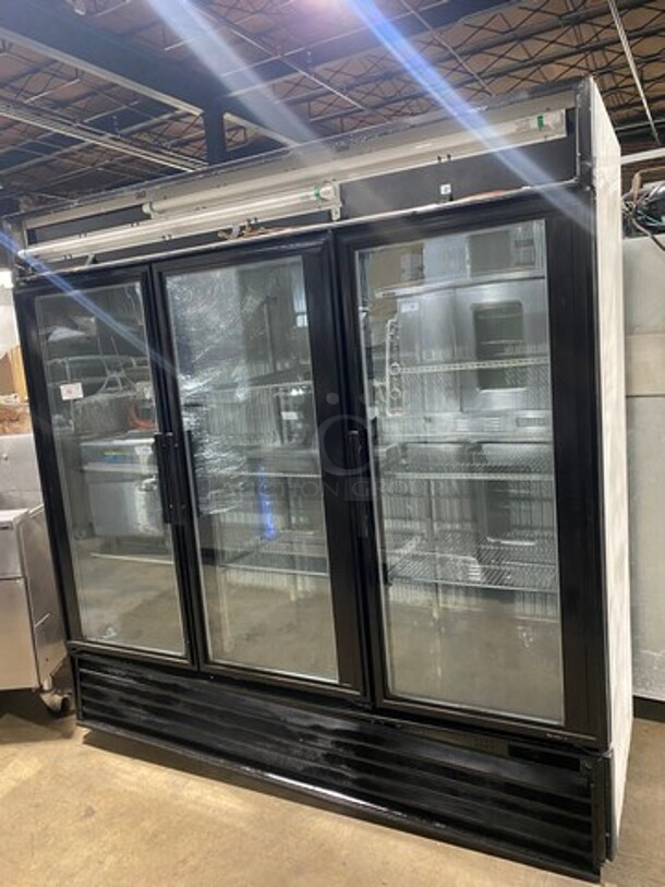 True Commercial 3 Door Reach In Freezer Merchandiser! With View Through Doors! With Poly Coated Racks! Model: GDM72F SN: 14613956 115/208/230V 60HZ 1 Phase