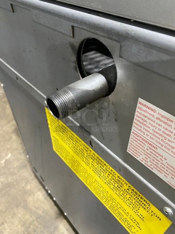 Garland Commercial Natural Gas Powered 4 Burner Stove! With Back Splash! With Oven Underneath! Metal Oven Rack! All Stainless Steel! On Casters! Model: M44R SN: 1601100100589 - Image 10 of 10