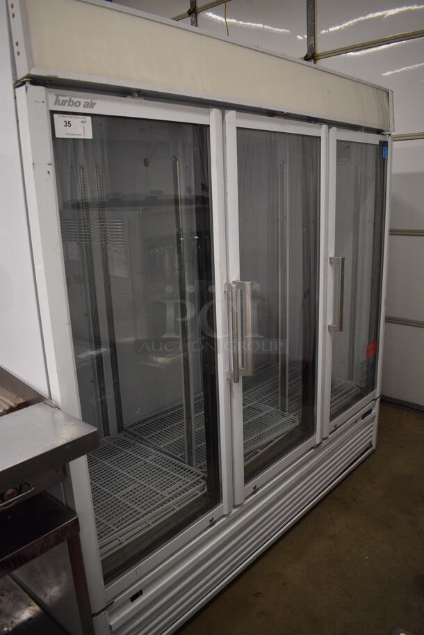 Turbo Air Model TGM-72SDW Metal Commercial 3 Door Reach In Cooler Merchandiser w/ Poly Coated Racks. 110-120 Volts, 1 Phase. 78x32x79. Tested and Does Not Power On
