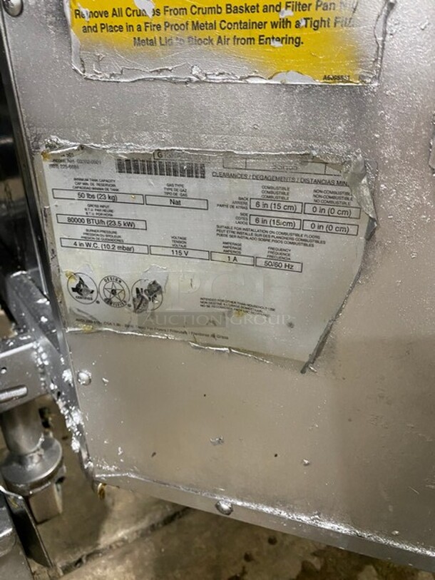 Pitco Frialator Stainless Steel Commercial Natural Gas Powered 2 Bay Deep Fat Fryer w/ 4 Metal Fry Baskets! On Commercial Casters! MODEL SSH55   - Image 9 of 11