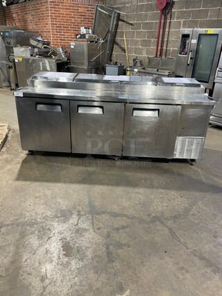 NICE! All Stainless Steel Commercial Refrigerated Pizza Prep Table! With 3 Door Refrigerated Storage Underneath! On Casters! 115V 1 Phase!