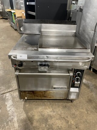Garland Commercial Natural Gas Powered Flat Griddle With Left Side Hot Plate! Griddle Has Side Splashes! With Back Splash! With Convection Oven Underneath! All Stainless Steel! On Legs!