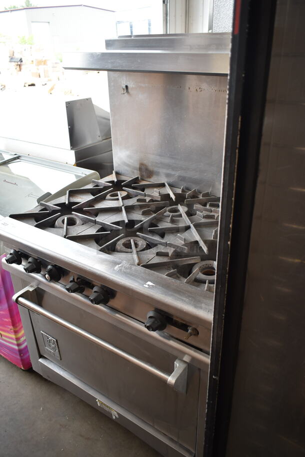 Wolf Stainless Steel Commercial Natural Gas Powered 6 Burner Range w/ Oven, Back Splash and Over Shelf on Commercial Casters.  - Image 2 of 12