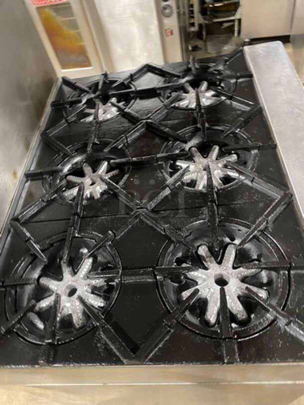 Garland Commercial Natural Gas Powered 6 Burner Stove! With Raised Back Splash And Salamander Shelf! With Oven Underneath! All Stainless Steel! On Legs! - Image 5 of 8