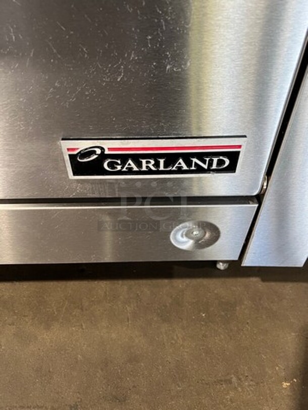 WOW! NEW OUT OF THE BOX! NEVER USED! Garland Heavy Duty Commercial Electric Powered 6 Burner Range With Full Size Convection Oven Underneath! All Stainless Steel Body! With Oven Racks! Model 36ER33 - Image 9 of 9