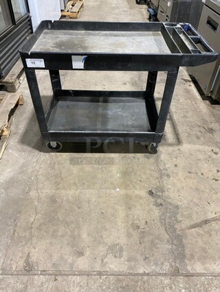 Commercial Black 2-Shelf Utility Cart with Flat Top and Built-In Tool Compartment! On Casters!