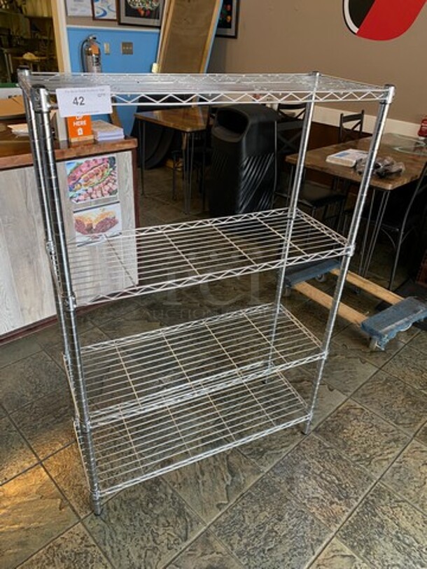 Commercial Metal 4 Tier Shelf! On Legs! BUYER MUST DISMANTLE! PCI CANNOT DISMANTLE FOR SHIPPING! PLEASE CONSIDER FREIGHT CHARGES! - Image 1 of 5