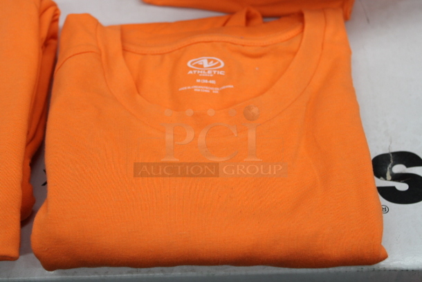 ALL ONE MONEY!! (10) Blaze Orange Hat / Vest Combo Your Bid, (2) Orange Hats, Stack of 17 Orange Athletic Shirts [Sizes: 8 2XL, 6 L, 1 M, 1 3XL]
 - Image 8 of 9