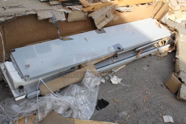 BRAND NEW SCRATCH & DENT! Regency 24" x 96" 16-Gauge Stainless Steel Commercial Work Table with 4" Backsplash and Undershelf. Packaging is damaged. May be missing screws. 	 - Image 2 of 5