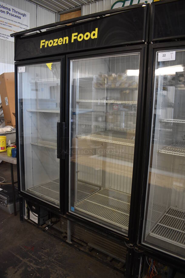 2014 True Model GDM-49F-LD ENERGY STAR Metal Commercial 2 Door Reach In Freezer Merchandiser w/ Poly Coated Racks. 115 Volts, 1 Phase. 54x30x79. Cannot Test - Unit Is Missing Power Supply