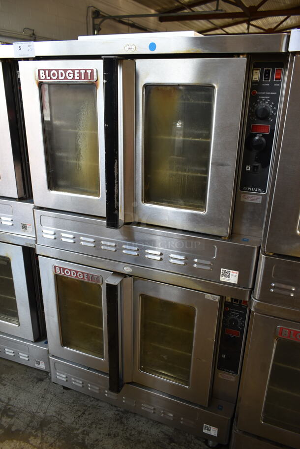 2 Blodgett Zephaire-200-G Stainless Steel Commercial Natural Gas Powered Full Size Convection Ovens w/ View Through Doors, Metal Oven Racks and Thermostatic Controls on Commercial Casters. 60,000 BTU. 2 Times Your Bid!