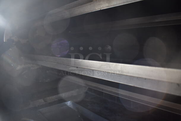 H. Ruiz 106 Stainless Steel Commercial Floor Style Wood Fired Grilled Chicken Rotisserie Oven on Commercial Casters. 59x38x66 - Image 6 of 11