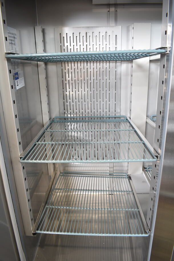 BRAND NEW SCRATCH AND DENT! 2024 Avantco 178SS3RHC Stainless Steel Commercial 3 Door Reach In Cooler w/ Poly Coated Racks on Commercial Casters. 115 Volts, 1 Phase. Tested and Working! - Image 6 of 7