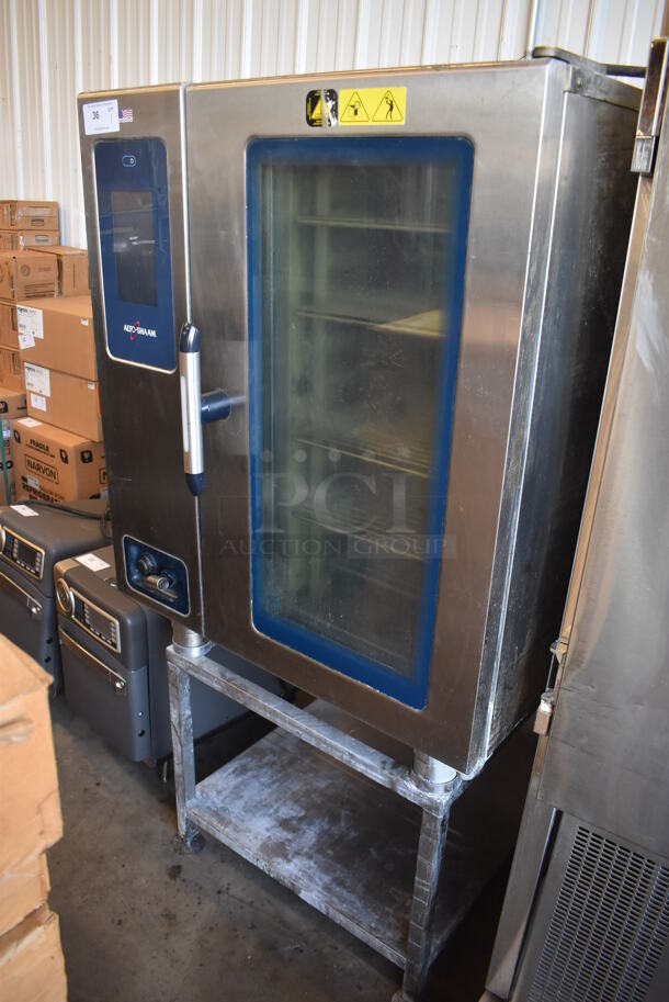 2015 Alto Shaam CTP10-10E Stainless Steel Commercial Electric Powered Combitherm Convection Oven on Metal Equipment Stand. 208-240 Volts, 3 Phase.