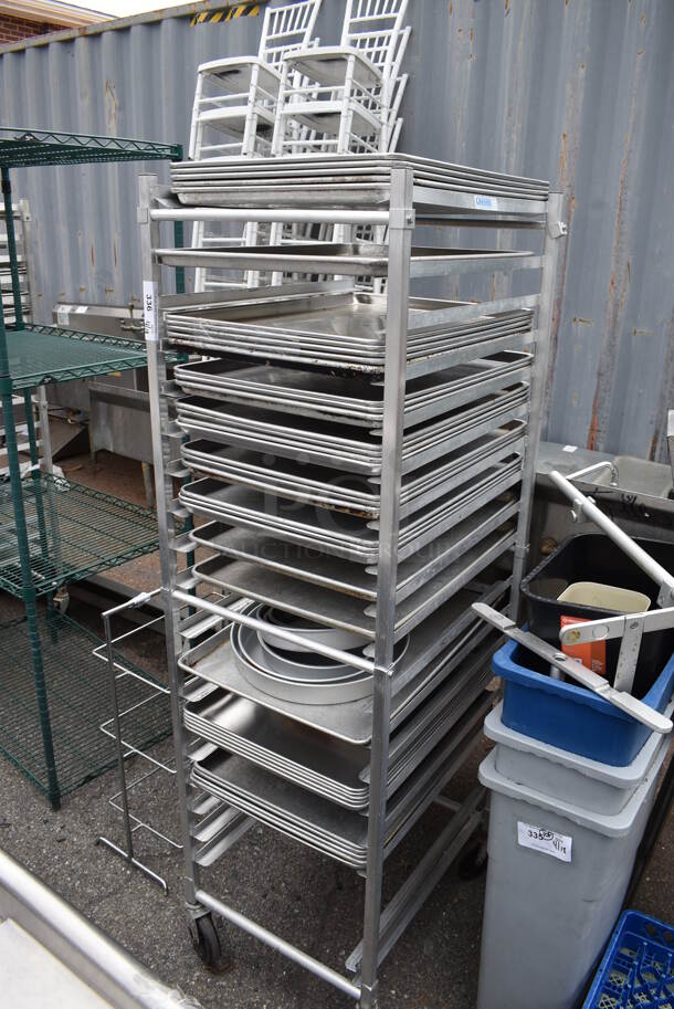 Metal Commercial Pan Transport Rack on Commercial Casters w/ 47 Metal Full Size Baking Pans.