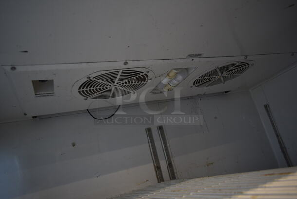 2015 True TG2R-2S ENERGY STAR Stainless Steel Commercial 2 Door Reach In Cooler w/ Poly Coated Racks on Commercial Casters. 115 Volts, 1 Phase. Tested and Working! - Image 6 of 8