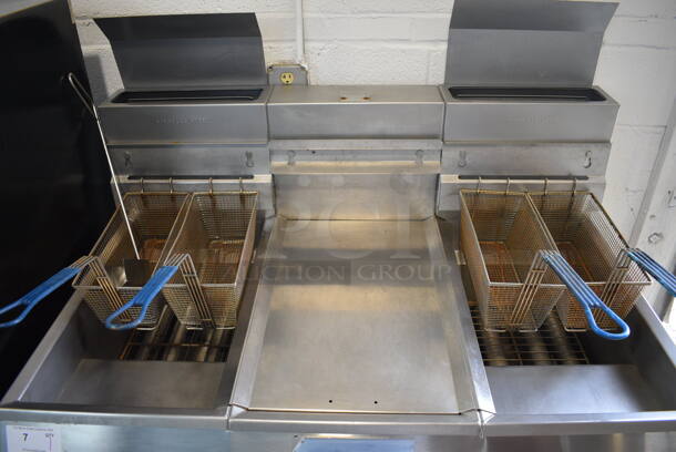 Pitco Frialator Model F14S-V Stainless Steel Commercial Floor Style Propane Gas 2 Bay Fryer w/ Center Dumping Station on Commercial Casters. 110,000 BTU. 49x32x54 - Image 3 of 9