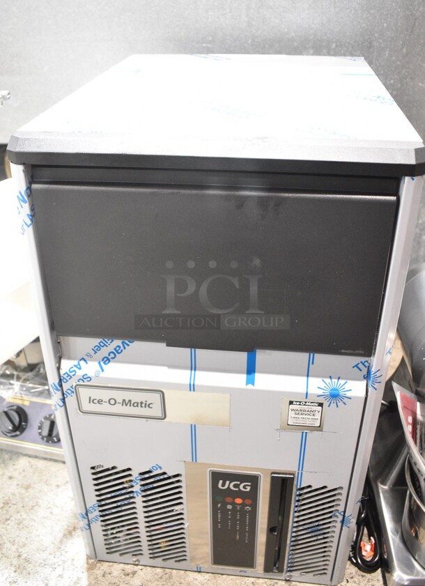 BRAND NEW SCRATCH AND DENT! 2022 Ice-O-Matic UCG 60 A Stainless Steel Commercial Undercounter Gourmet Cube Ice Machine. 115 Volts, 1 Phase.  - Image 2 of 8