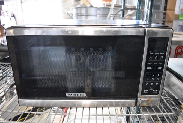 Black & Decker EM720CB7 Countertop Microwave Oven w/ Plate. 120 Volts, 1 Phase. 17x12x10 - Image 1 of 6