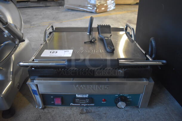 BRAND NEW SCRATCH AND DENT! Waring WPG250T Stainless Steel Commercial Countertop Supremo Grooved Top & Bottom Panini Sandwich Grill with Timer. 120 Volts, 1 Phase. 20x18x10. Tested and Working!