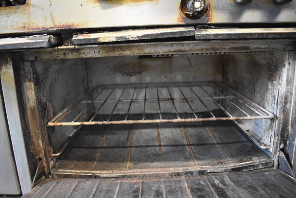 Garland SunFire Stainless Steel Commercial Natural Gas Powered 10 Burner Range w/ 2 Ovens, Over Shelf and Back Splash on Commercial Casters.  - Image 8 of 8